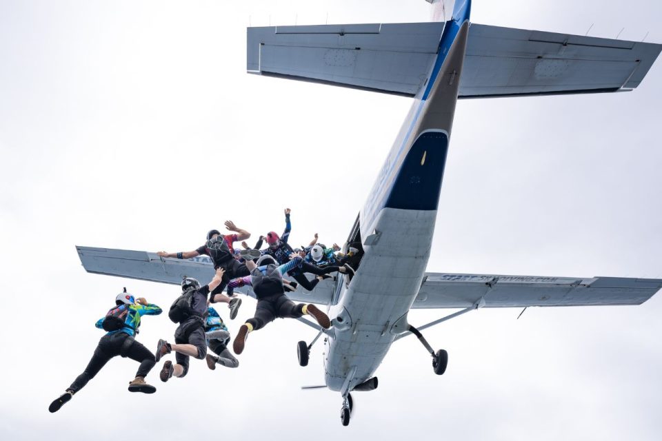 Group of fun jumpers leaping from the plane.