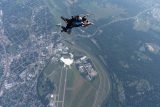Shot from above of tandem skydivers.